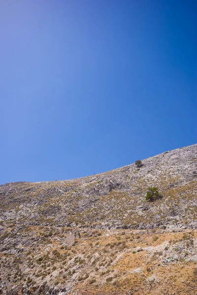 stock image Arid mountain and a blue sky