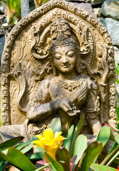 Kámen vyřezávaný buddha — Stock fotografie