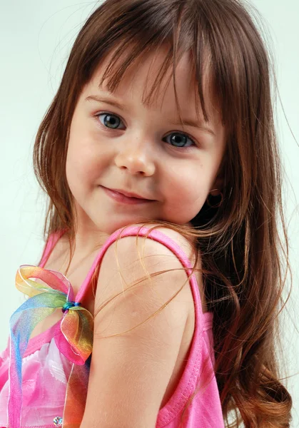 Красивая маленькая девочка в розовом платье Стоковое Изображение