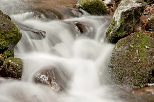 stock image Water flowing over rocks