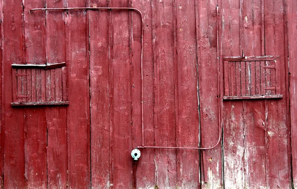 Kırmızı ahırın duvarı Stok Fotoğraf