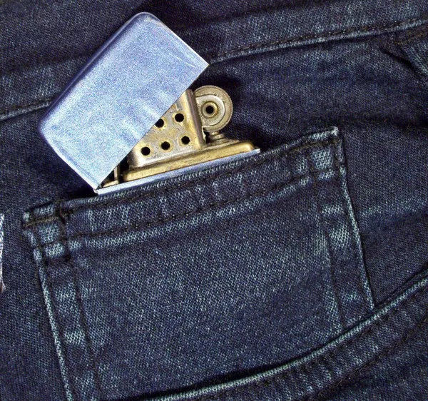 Encendedor en un bolsillo —  Fotos de Stock