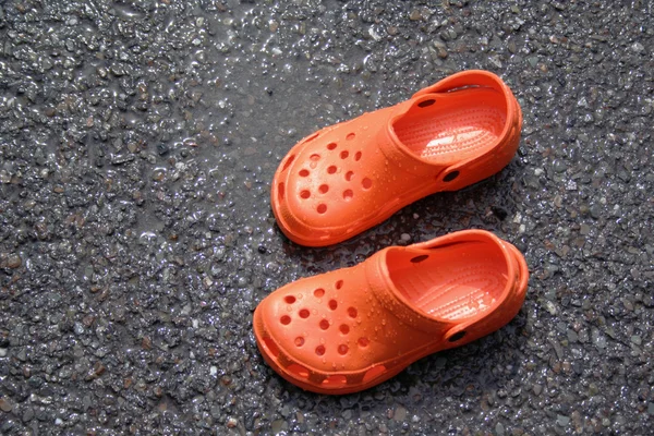 Orange croc style shoes — Stock Photo, Image
