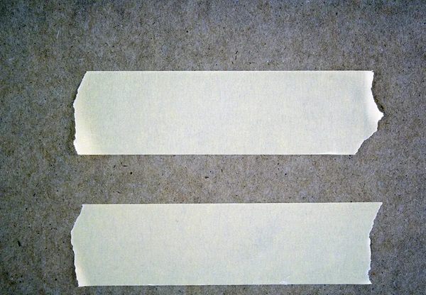 Полоски маскировочной ленты для знака — стоковое фото