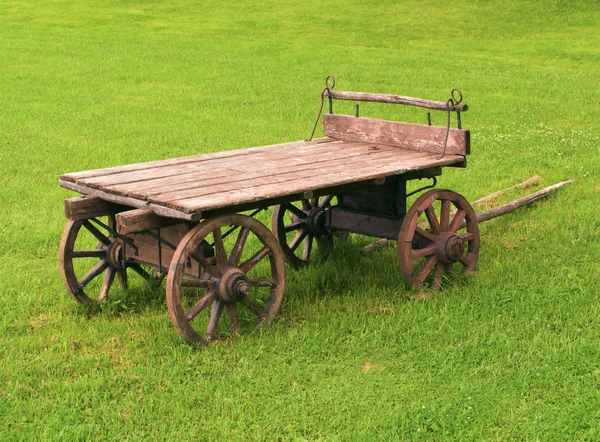 stock image Wooden cart in a field