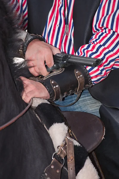 stock image Revolver in cowboy arm