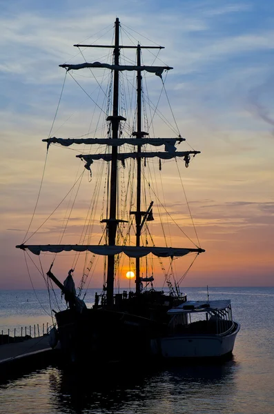 Stock image Pirate ship at sunset