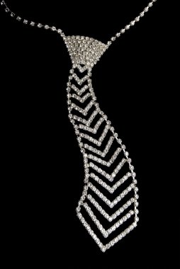 Tie from jewels on a black background clipart