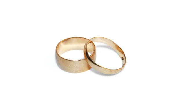 Stock image Two wedding rings are isolated on a white background.
