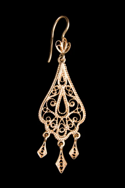 Graceful gold earring — Stock Photo, Image