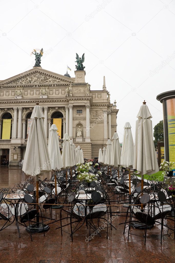 Opera theater and cafe before him. Lviv