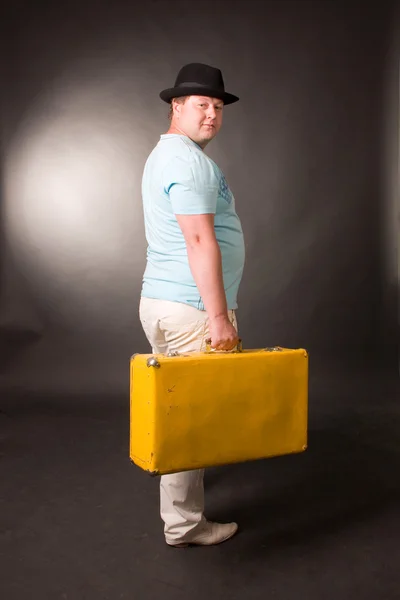 stock image An attractive man is in a studio