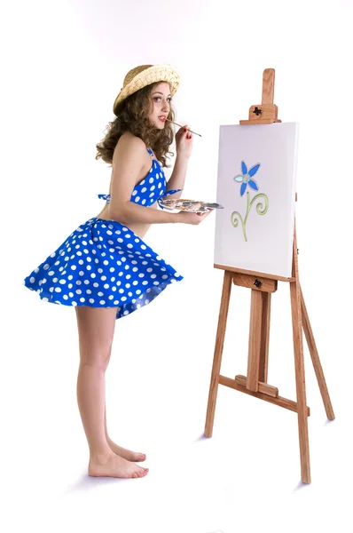 Girl with an easel — Stock Photo, Image