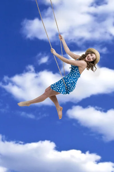 Girl on swings — Stock Photo, Image