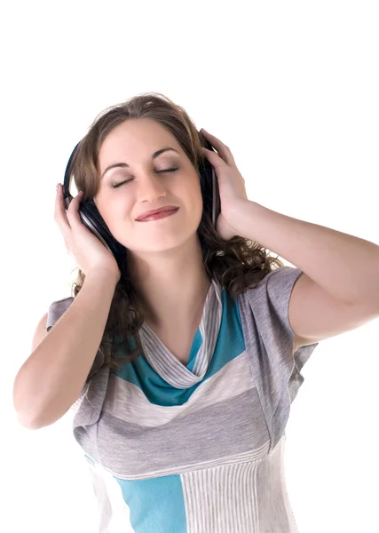 Jonge mooie gelukkige vrouwen luisteren muziek in hoofdtelefoon — Stockfoto