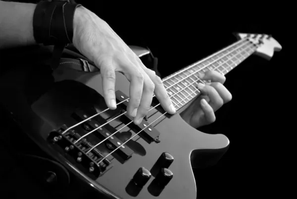 Playing bass-guiar — Stock Photo, Image
