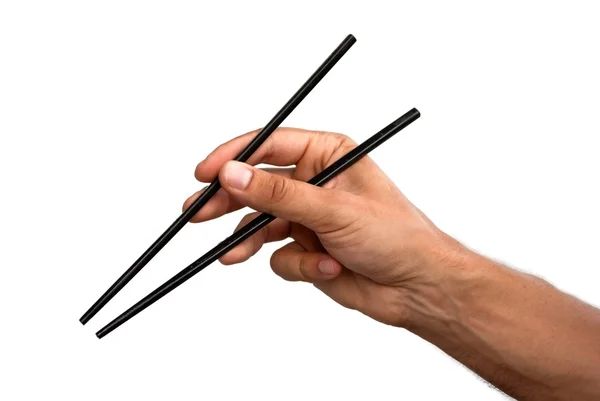 Рука з паличками для їжі Ліцензійні Стокові Фото