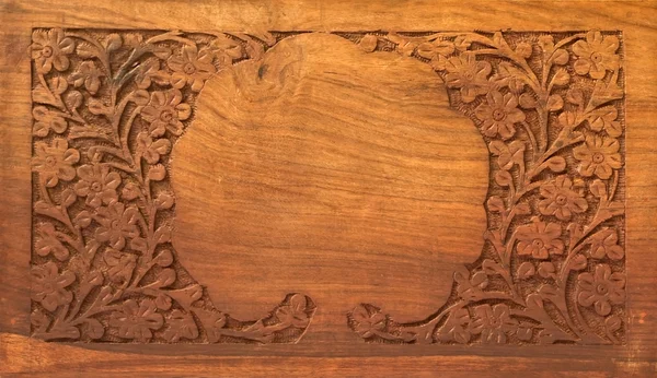 stock image Wooden desk with tree carved on it