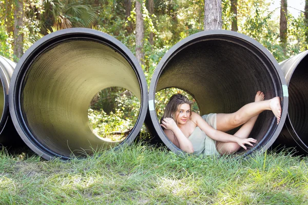 Beautiful Teen Girl in a Large Pipe — Stock Photo, Image