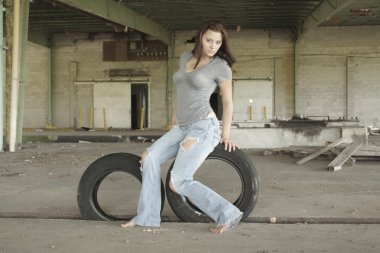 Sexy Brunette with Tattered Jeans (2) clipart