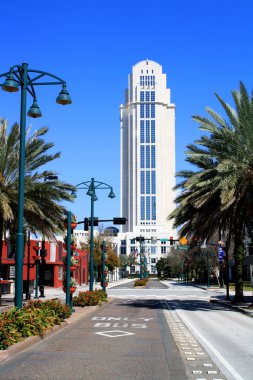 A vertical view of downtown Orlando, Florida, looking north on Magnolia Avenue at the Orange County courthouse. clipart