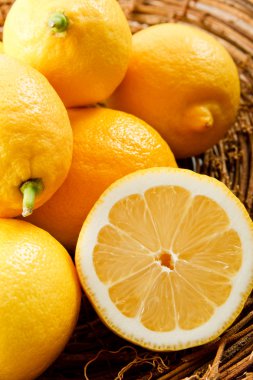 Close up of juicy yellow lemons clipart