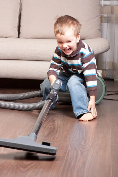 Small boy with vacuum cleaner — Stock Photo, Image