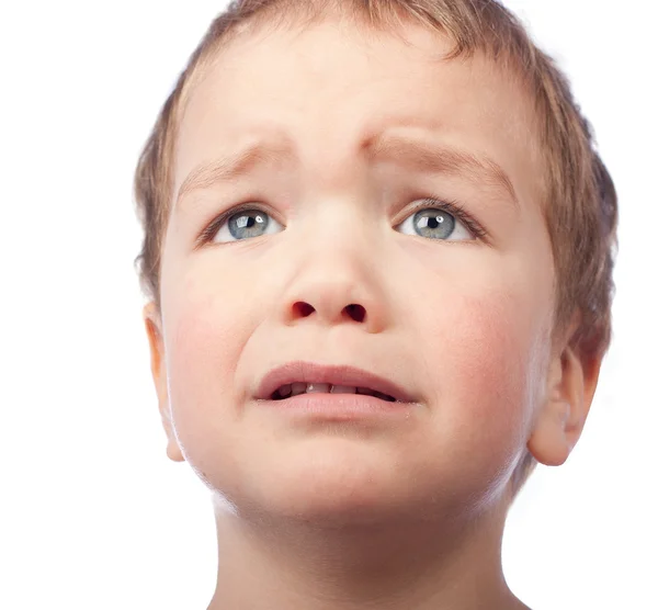 Портрет маленького сумного хлопчика — стокове фото