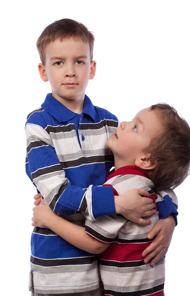 Younger brother looks at his big brother — Stock Photo, Image