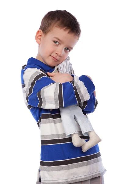Chłopiec przytulić zabawka, izolacji — Zdjęcie stockowe