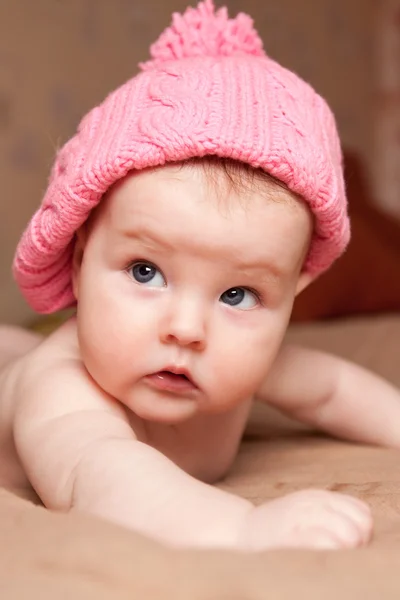 Portrait of small girl in a pink hat — Stock Photo, Image
