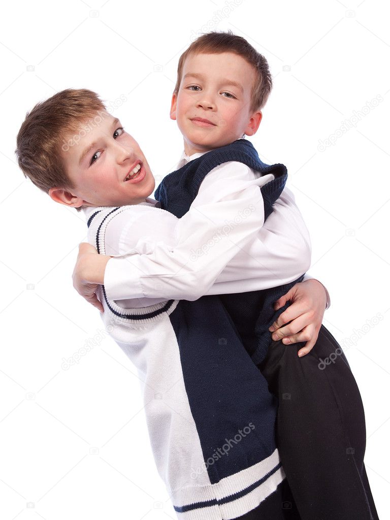 Two merry brothers hugging