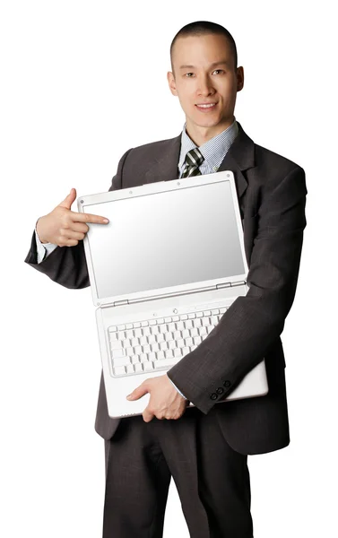 Obchodník s otevřenou laptop ukazuje něco — Stock fotografie