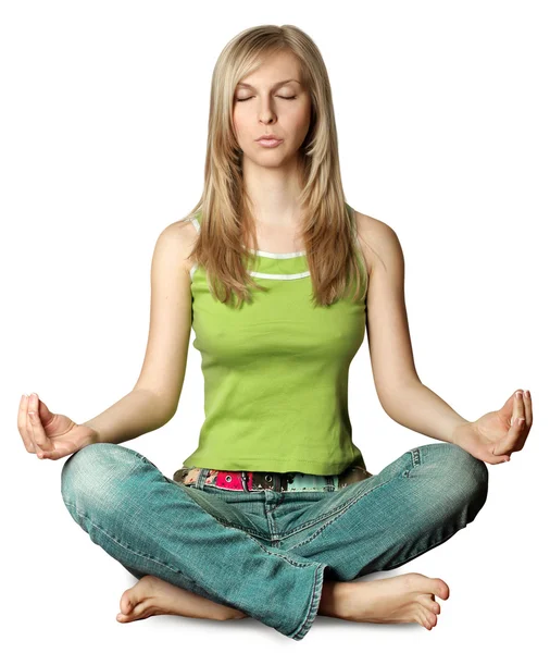 Frau meditiert in Lotus-Pose — Stockfoto