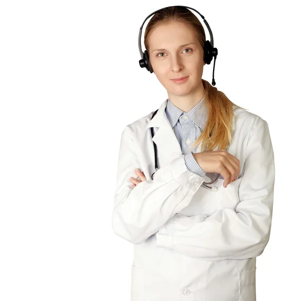Médico mujer con auriculares sonrisa en la cámara — Foto de Stock
