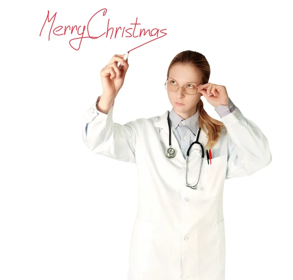 Doktor kadın mutlu Noeller yazma — Stok fotoğraf