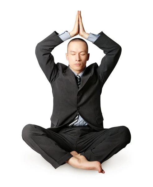 Empresario en pose de loto meditando — Foto de Stock
