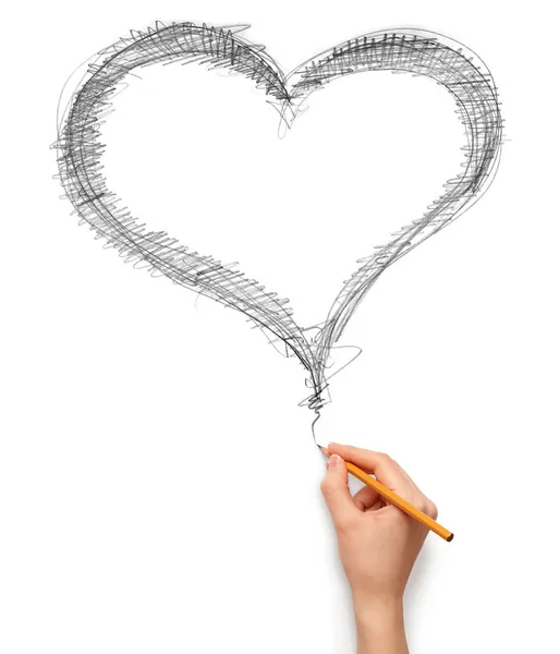 Сердце и рука с карандашом — стоковое фото