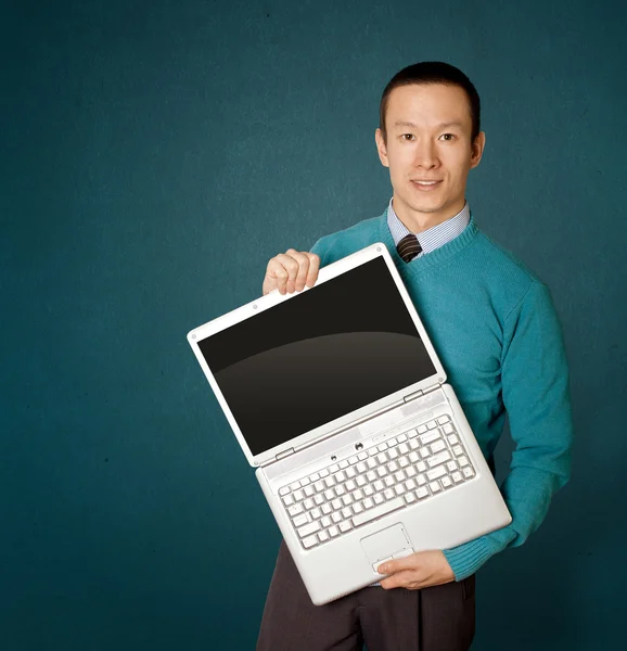 Uomo in blu con laptop — Foto Stock