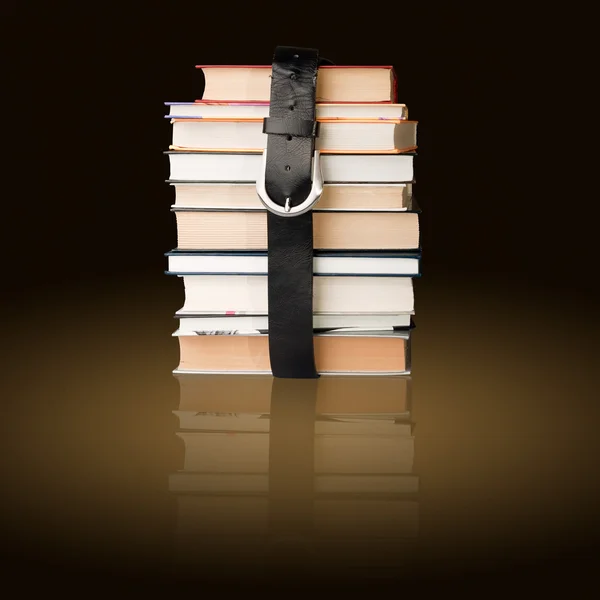 Books pile with belt — Stock Photo, Image