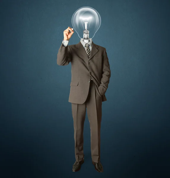 Uomo d'affari con testa di lampada e marcatore — Foto Stock