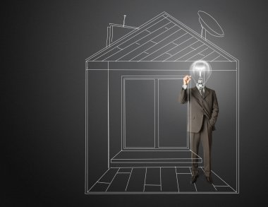 Businessman with lamp-head and marker in house clipart