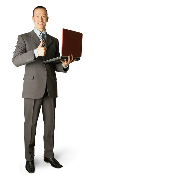 Full längd porträtt av affärsman med laptop — Stockfoto