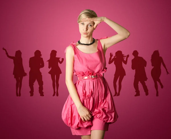 Azafata femenina sexy en rosa — Foto de Stock