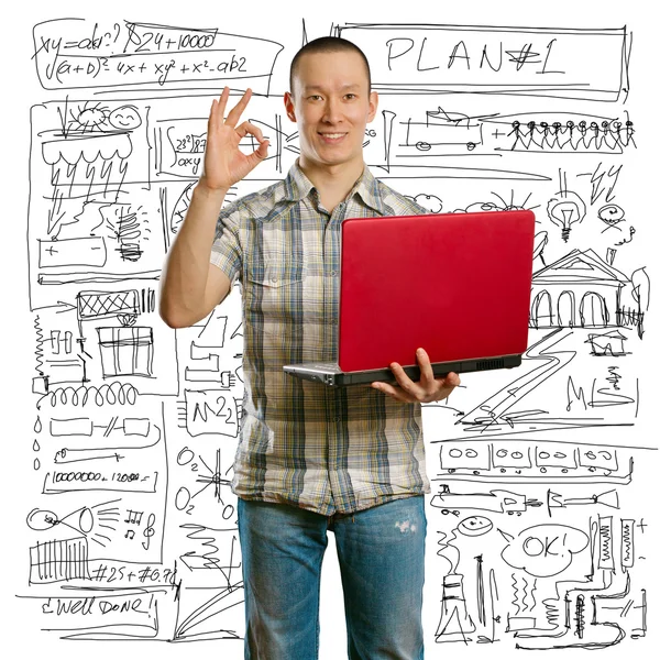 Aziatische man met laptop in zijn handen toont ok — Stockfoto