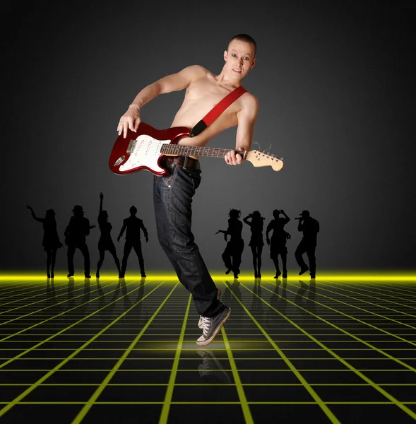 Punk man met de gitaar en silhouet — Stockfoto