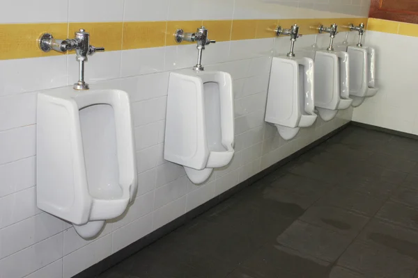 Urinals in public toilet — Stock Photo, Image