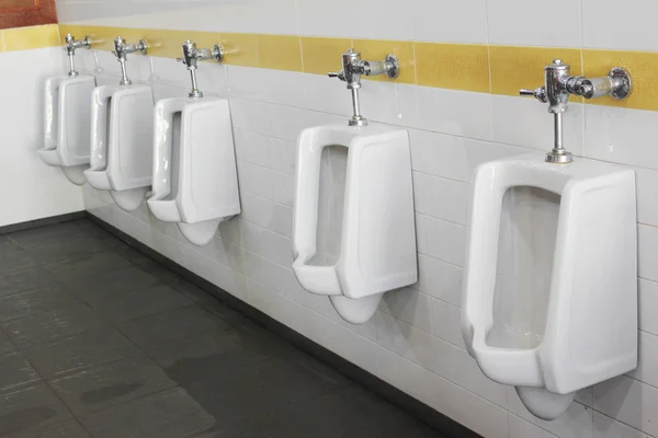Urinals in public toilet — Stock Photo, Image