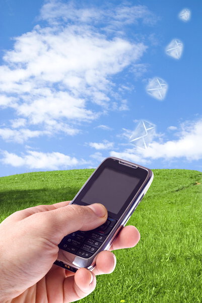 Hand with mobile phone isolated on white background