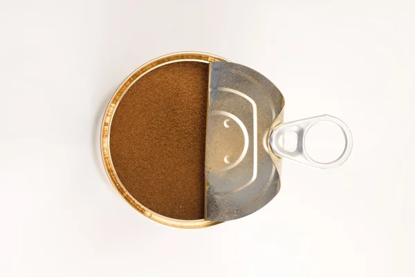 Grãos de café em jarra de ferro — Fotografia de Stock